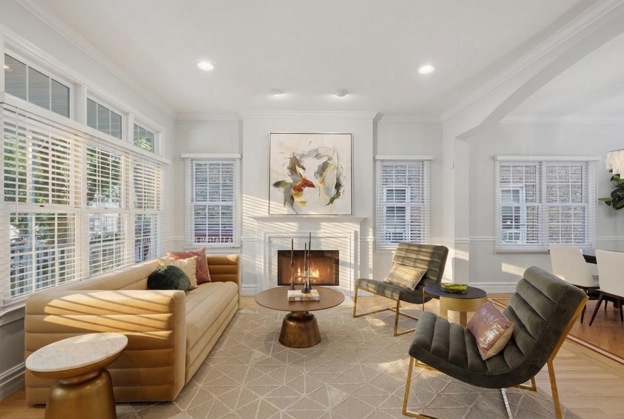 Sunlit living room with fireplace